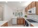 Bright kitchen featuring an eat-in breakfast bar and modern appliances at 3724 E Derringer Way, Gilbert, AZ 85297