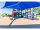 Community playground with train equipment and shade structure at 3724 E Derringer Way, Gilbert, AZ 85297