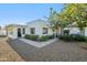 Charming single-story home with a neutral color palette, desert landscaping, and a welcoming entrance at 39 E Tam Oshanter Dr, Phoenix, AZ 85022