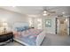 Bright main bedroom with neutral décor, ceiling fan, and natural light at 39 E Tam Oshanter Dr, Phoenix, AZ 85022