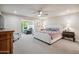 Spacious main bedroom with neutral tones, comfortable furnishings, and access to a sitting area at 39 E Tam Oshanter Dr, Phoenix, AZ 85022