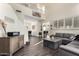 Spacious living room with tall ceilings, hardwood floors, and modern decor, creating an inviting atmosphere at 4038 E Wagon Cir, Gilbert, AZ 85297