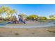 Community playground offers a fun, safe space for children with slides and swings at 4038 E Wagon Cir, Gilbert, AZ 85297