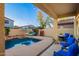Inviting backyard pool with a covered patio perfect for entertaining and relaxing at 4038 E Wagon Cir, Gilbert, AZ 85297