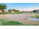 Sandy volleyball court offers recreational opportunities in a neighborhood park setting at 4038 E Wagon Cir, Gilbert, AZ 85297