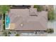 Aerial view of the roof, highlighting pool and outdoor living space at 41627 N Cedar Chase Rd, Anthem, AZ 85086