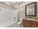 Well-appointed bathroom with a tub, shower, granite vanity, and modern fixtures at 41627 N Cedar Chase Rd, Anthem, AZ 85086