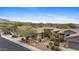 Single-Gathering home with desert landscaping and three-car garage in a residential neighborhood at 41627 N Cedar Chase Rd, Anthem, AZ 85086