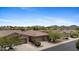 Three-car garage home with desert landscaping, paver driveway and sidewalks at 41627 N Cedar Chase Rd, Anthem, AZ 85086