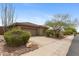 A well-maintained front yard complements this home's exterior at 41627 N Cedar Chase Rd, Anthem, AZ 85086