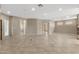 Bright living room with neutral decor and easy access to other rooms at 41627 N Cedar Chase Rd, Anthem, AZ 85086