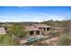 This home features a backyard with a private pool, spa, and mountain views at 41627 N Cedar Chase Rd, Anthem, AZ 85086