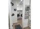 Laundry room with washer, dryer, wire magazine rack, and decorative mirrors at 4540 N 35Th N Ave, Phoenix, AZ 85017