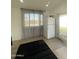 Bright living space with a window, appliances, and door, offering ample living space at 4540 N 35Th N Ave, Phoenix, AZ 85017