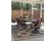 Cozy outdoor dining area under a covered patio, perfect for enjoying meals outside at 4540 N 35Th N Ave, Phoenix, AZ 85017