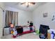 Cozy bedroom featuring a plush bed, soft carpet, and warm, inviting decor at 4605 W Fawn Dr, Laveen, AZ 85339