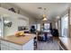 Open kitchen area with stainless steel appliances, and eat in dining area at 4605 W Fawn Dr, Laveen, AZ 85339