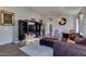 Open concept living space features hard surface flooring, plush furniture, and neutral colors at 4605 W Fawn Dr, Laveen, AZ 85339