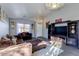 Open concept living room features neutral decor, vaulted ceilings and lots of natural light at 4605 W Fawn Dr, Laveen, AZ 85339