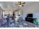 Bright living room featuring neutral walls, decorative rug, comfortable furniture and plenty of light at 4605 W Fawn Dr, Laveen, AZ 85339