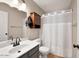 Neutral bathroom featuring vanity, toilet and shower with curtain in a well-lit space at 5135 E Evergreen St # 1159, Mesa, AZ 85205