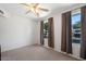A bedroom featuring two windows with curtains at 5135 E Evergreen St # 1159, Mesa, AZ 85205