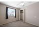 Neutral bedroom featuring carpeted floors, a window and closet providing ample space at 5135 E Evergreen St # 1159, Mesa, AZ 85205