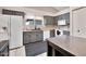 A bright kitchen featuring stainless appliances, light countertops and ample cabinet space at 5135 E Evergreen St # 1159, Mesa, AZ 85205
