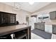 A spacious kitchen features a breakfast bar, stainless appliances, and ample cabinet space at 5135 E Evergreen St # 1159, Mesa, AZ 85205