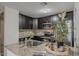 Kitchen featuring granite countertops, a tiled backsplash, and stainless steel appliances at 5302 E Van Buren St # 3040, Phoenix, AZ 85008