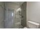 Bathroom with a glass enclosed shower that has a gray tile surround at 5302 E Van Buren St # 3040, Phoenix, AZ 85008