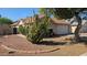 Charming front yard features a large cactus and desert landscaping, adding unique curb appeal to this cozy home at 537 E Piute Ave, Phoenix, AZ 85024