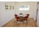 Charming dining room with a glass table and comfortable seating, perfect for Gathering meals at 5550 N 12Th St # 15, Phoenix, AZ 85014
