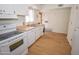 Efficient kitchen space featuring modern appliances, ample counter space, and a clean, bright design at 5550 N 12Th St # 15, Phoenix, AZ 85014