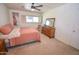 Relaxing main bedroom featuring ample space, comfortable bedding, and natural light at 5550 N 12Th St # 15, Phoenix, AZ 85014