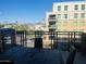 A cozy balcony with a metal table and chairs, ideal for outdoor dining and relaxation at 6803 E Main St # 4415, Scottsdale, AZ 85251