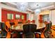 Executive conference room boasts a glass table, seating for many, and modern lighting, ideal for meetings at 6803 E Main St # 4415, Scottsdale, AZ 85251