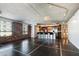 Open-concept kitchen with modern appliances, black bar stools, and concrete ceiling and flooring at 6803 E Main St # 4415, Scottsdale, AZ 85251