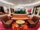 Comfortable lobby featuring a central garden, surrounded by inviting seating and soft, overhead lighting at 6803 E Main St # 4415, Scottsdale, AZ 85251