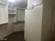 Spacious walk-in closet with ample shelving and closet rod, creating a large space for clothing storage at 6803 E Main St # 4415, Scottsdale, AZ 85251