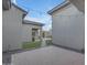 Landscaped backyard with pavers and synthetic grass offers privacy and outdoor living space at 7130 E Navarro Way, Scottsdale, AZ 85266