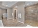 Bright bathroom featuring a walk-in shower, soaking tub, and seamless access to other areas at 7130 E Navarro Way, Scottsdale, AZ 85266