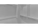 White shelving and chrome hanging rod in closet at 7130 E Navarro Way, Scottsdale, AZ 85266