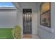Charming front door with succulent and 'hello' door mat at 7130 E Navarro Way, Scottsdale, AZ 85266