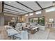 Beautiful living room with open floor plan, light colored furnishings, and lots of light at 7130 E Navarro Way, Scottsdale, AZ 85266