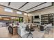 Bright and spacious living room with fireplace, clerestory windows, and seamless indoor/outdoor living at 7130 E Navarro Way, Scottsdale, AZ 85266