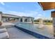 Beautiful pool with water features, lounge chairs and view of home at 7130 E Navarro Way, Scottsdale, AZ 85266