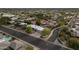 Expansive aerial view of neighborhood, homes, and lush landscaping with swimming pool at 7232 N 22 Nd St, Phoenix, AZ 85020