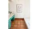 Bright bathroom featuring vibrant cabinetry, a clean bathtub, and stylish decor elements at 7232 N 22 Nd St, Phoenix, AZ 85020