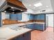 Spacious kitchen featuring ample cabinet space, tile floors and modern appliances at 7232 N 22 Nd St, Phoenix, AZ 85020